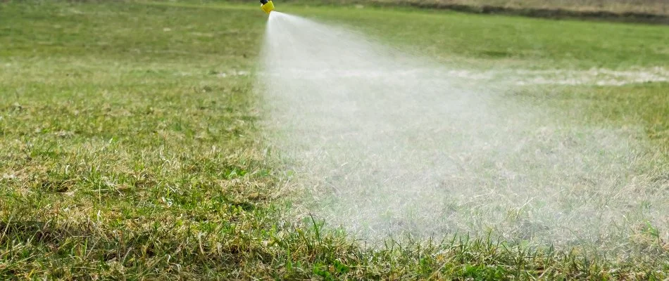 Liquid fertilizer being sprayed on a lawn in Mansfield, OH.