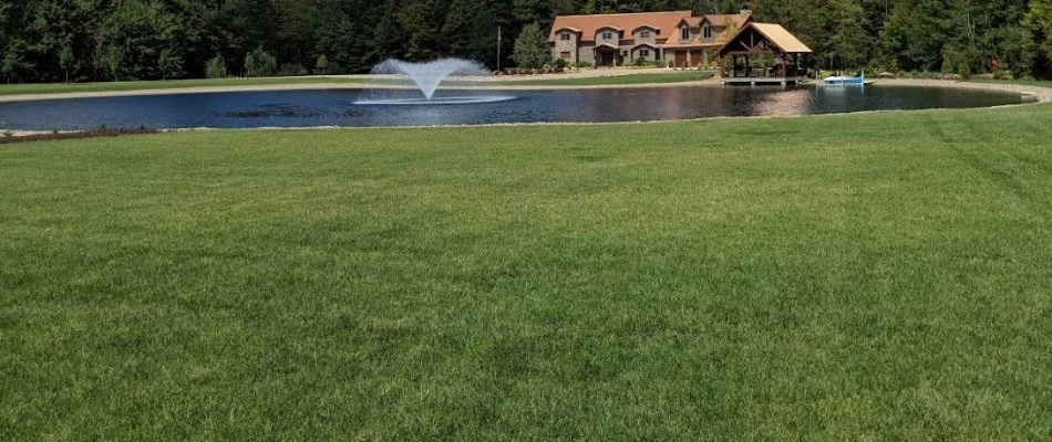 Green lawn near a pond in Mansfield, OH.