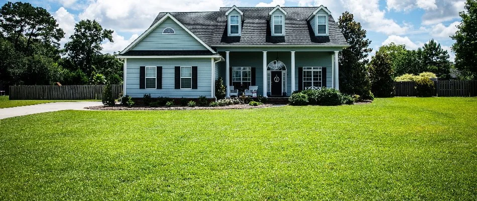Fertilized green lawn in front of a house in Olmsted Falls, OH.