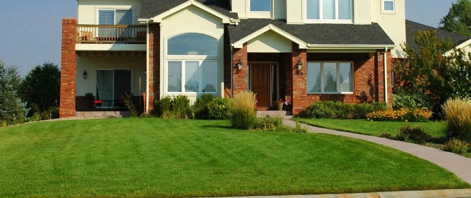 House in Gahanna, OH, with healthy, fertilized lawn.